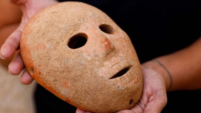 Israel unveils 9,000-year-old mask from the West Bank