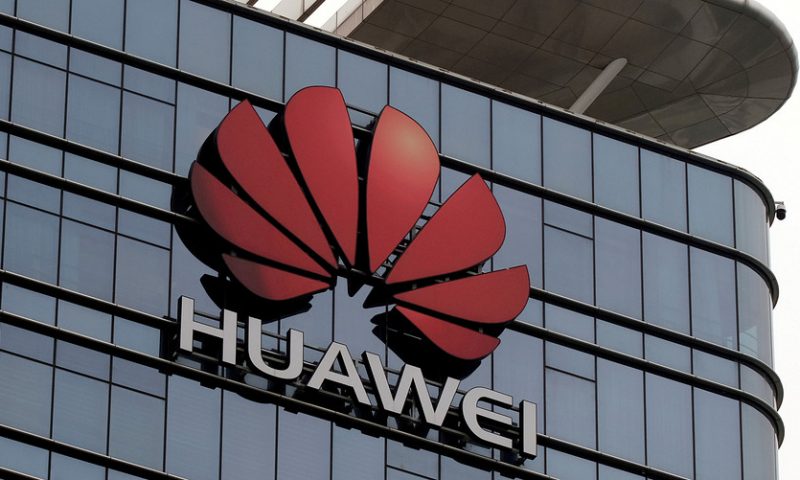 Asian markets mixed as investors weigh Huawei implications