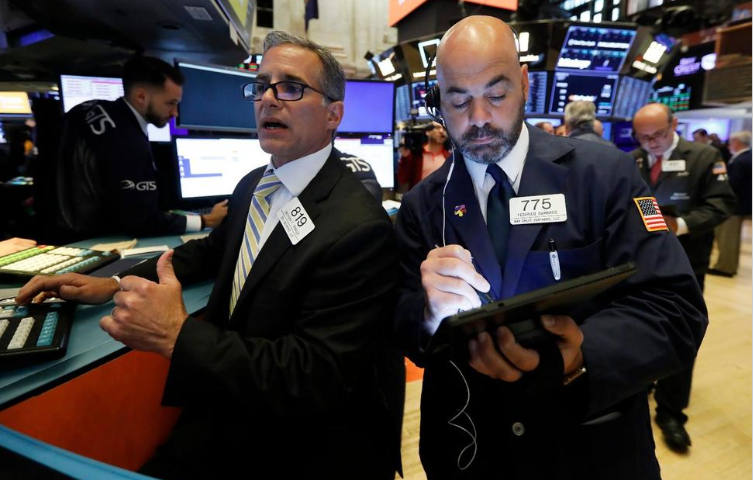 Stocks Post Small Losses; Investors Look Ahead to Fed