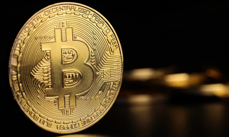 Bitcoin tops $9,000 level for first time in 13 months