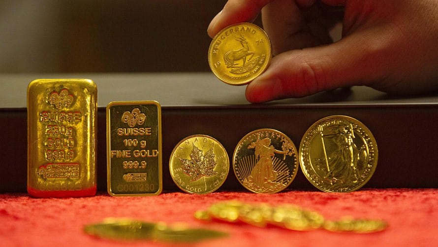 Gold futures settle at 14-month high