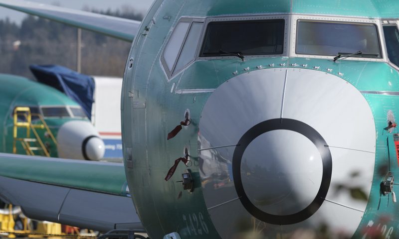 Dow closes at record after Boeing surges on report of 737 Max early return
