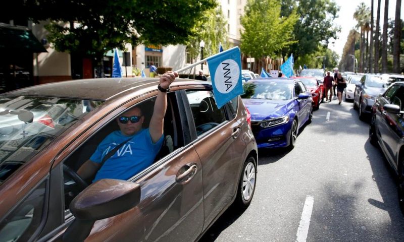 Uber, Postmates Sue to Challenge California’s New Labor Law