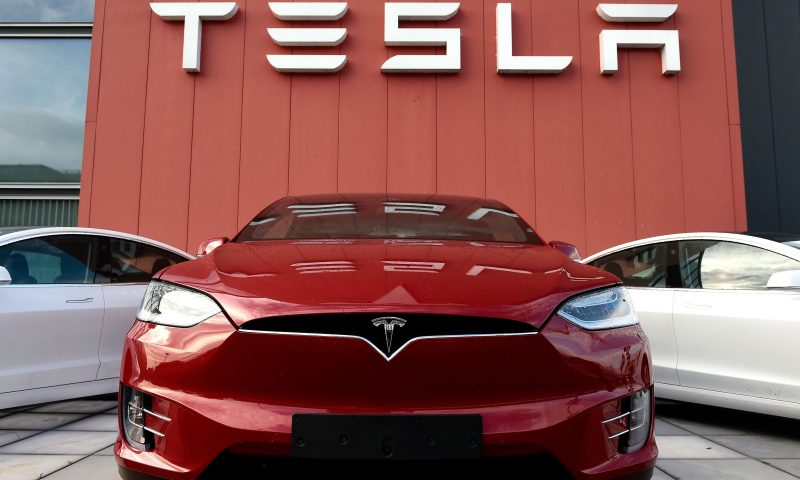 Tesla stock jumps above $900, biggest gain in two weeks