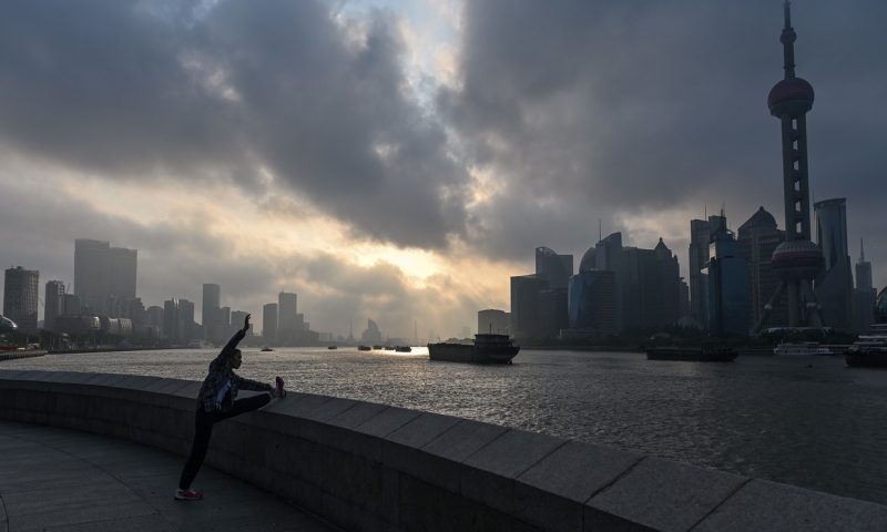 Shanghai Composite slumps 4% after data and as vaccine hopes fade