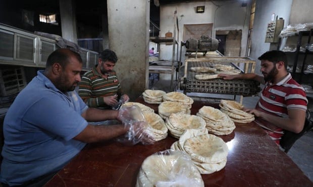 Syria introduces limits on subsidised bread as economic crisis bites