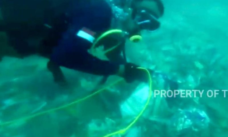 Indonesia Navy Divers Hunt for Crashed Plane’s Black Boxes
