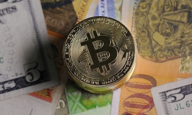 Bitcoin price hits new record, clears $60,000 milestone