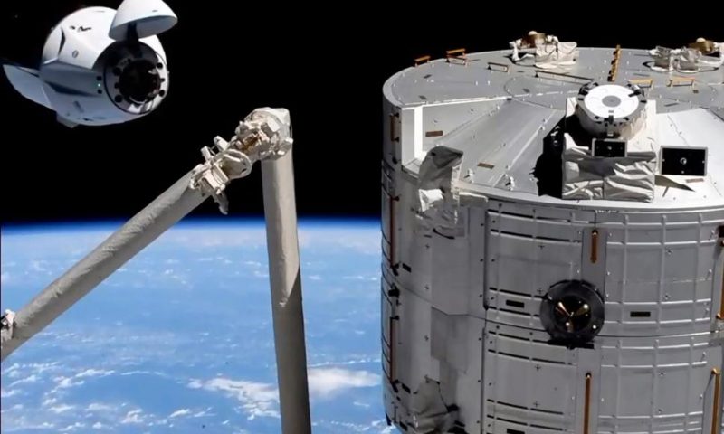 Old SpaceX Capsule Delivers New Crew to Space Station