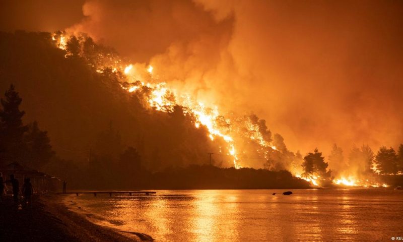 Greece wildfires: Evia island residents forced to evacuate