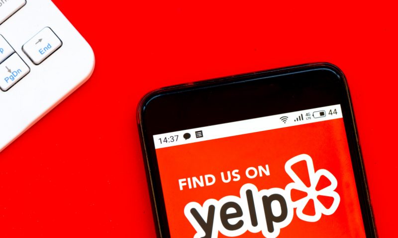 Yelp earnings show surprise profit, stock jumps 14%