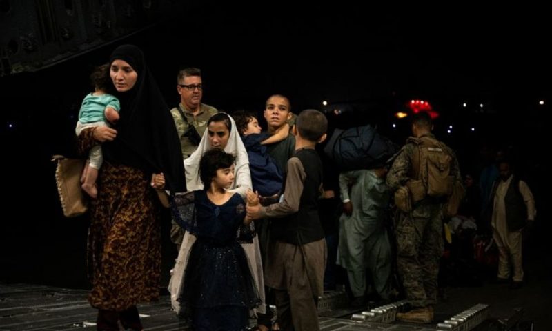 Afghan Evacuees Start Arriving in Kuwait, U.S. Envoy Says