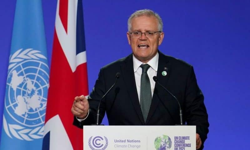 Australia PM, Criticised on Climate, Urges Firms to Curb Costs