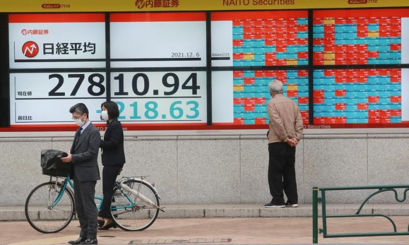 Asian Shares Mixed After China Evergrande Warns of Cash Woes