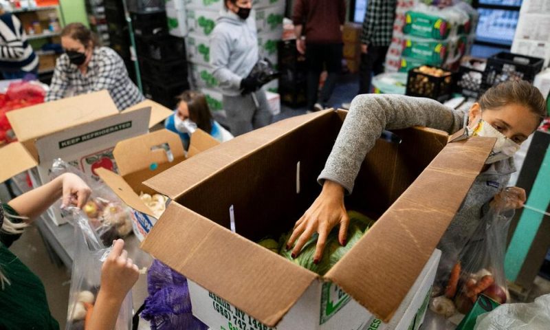 Food Banks See More Volunteers, but Uncertainty Looms