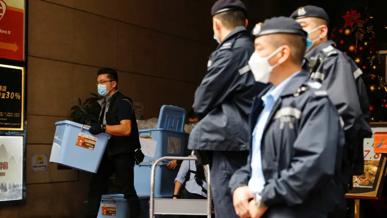 Hong Kong pro-democracy news site closes after raid, arrests