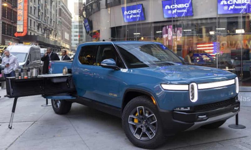 Rivian (NASDAQ:RIVN) Expected to Post Earnings of -$1.58 Per Share