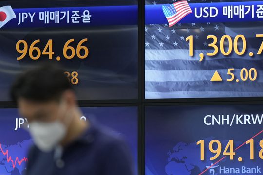 Shares in Asia track gains on Wall Street