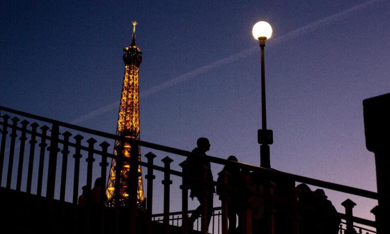 Eiffel Tower to Go Dark Earlier as Paris Saves Energy