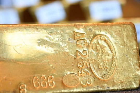 Gold tops $1,700 an ounce; silver settles at highest since June