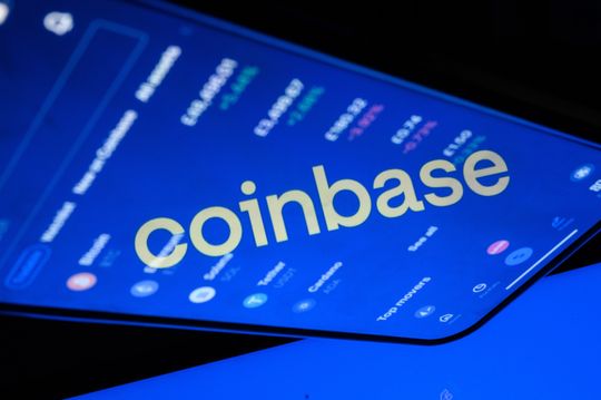 Coinbase’s stock pulls back after record rally fueled by regulatory optimism