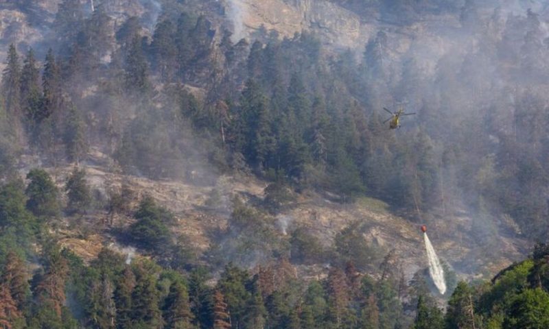 Switzerland Fights to Contain Forest Fire Near Italy Border as Winds Pick Up