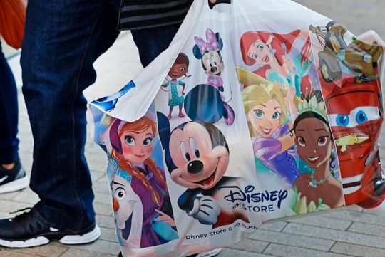 Disney’s stock closes at a 9-year low, and it still may not be cheap