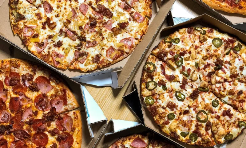 Oppenheimer Reiterates Outperform Rating for Domino’s Pizza (NYSE:DPZ)