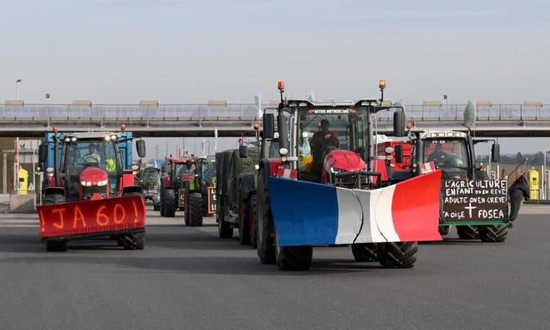 France’s Protesting Farmers Encircle Paris With Tractor Barricades, Vowing a ‘Siege’ Over Grievances