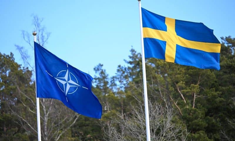 Sweden’s Flag Is Raised at NATO Headquarters to Cement Its Place as the 32nd Member of the Alliance