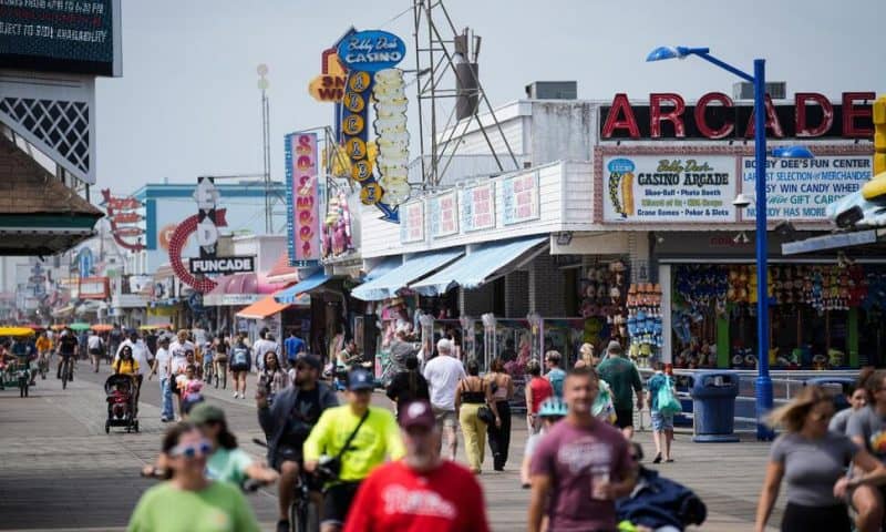 Summer Tourists Flock to Boardwalks and Piers While Sticking to Their Budgets