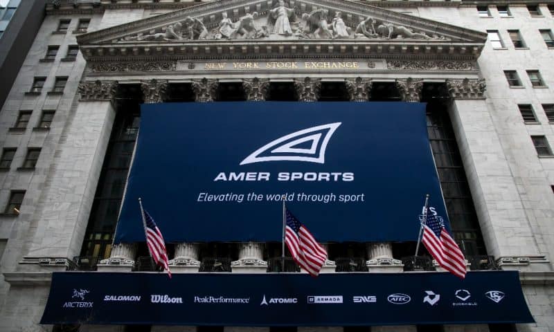 Amer Sports (NYSE:AS) Shares Down 5.2%