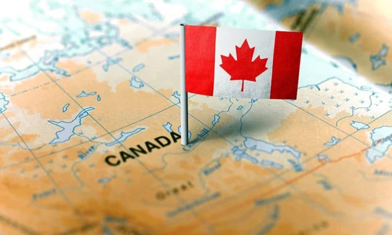 Canada to cut immigration numbers, government source says