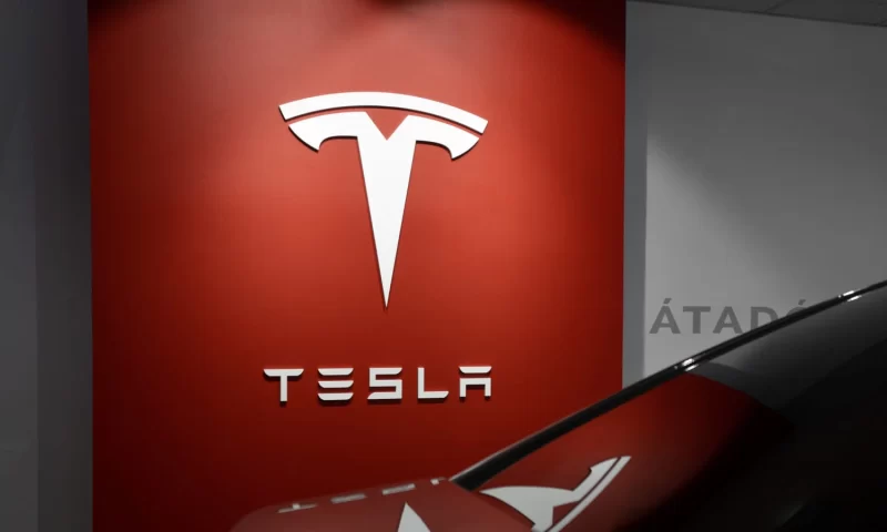 Tesla (NASDAQ:TSLA) Stock Price Up 7.4% – What’s Next?