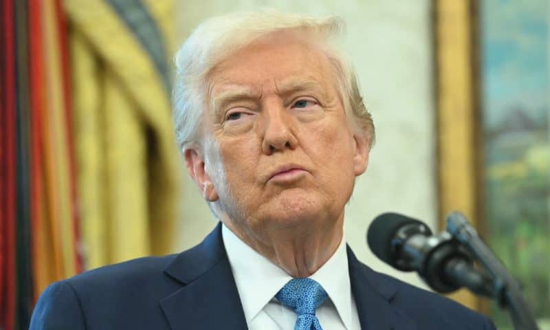 US stocks close higher after Trump signals thaw in trade war