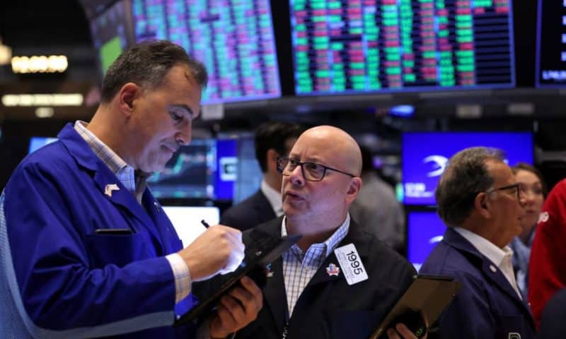 US stocks end up on jobs data, China hopes; Tesla bounces