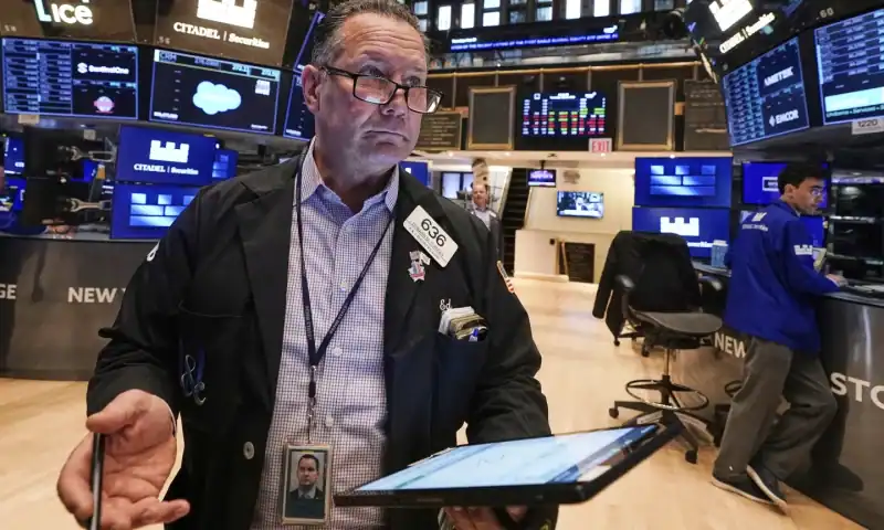 Wall Street futures edge lower in light trading