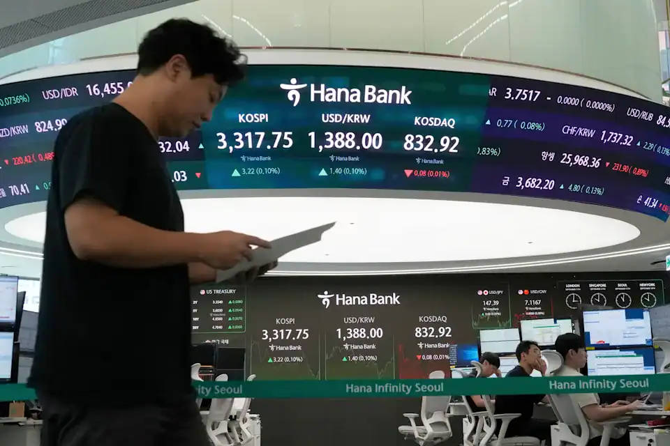 Asian shares are mostly up after US stocks inch to more records as inflation slows and Oracle soars
