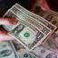 Dollar steady as markets await progress on Middle East peace talks